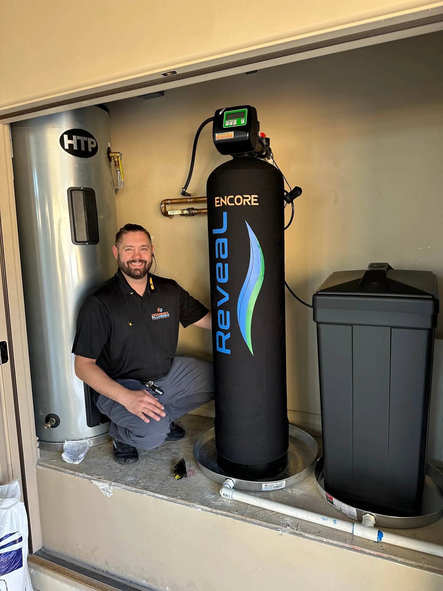 Dominick Plumbing technician working in a Scottsdale home